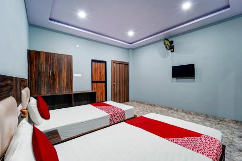 Letto o letti in una camera di Hotel O Snug Inn