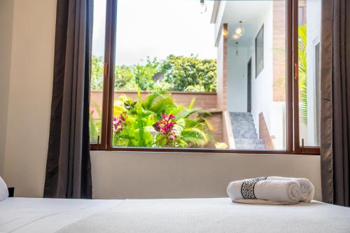 Postel nebo postele na pokoji v ubytování Toucan Platinum Suites Aparthotel