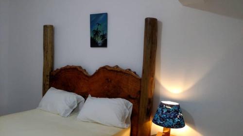 Ένα ή περισσότερα κρεβάτια σε δωμάτιο στο Mount Meru Baraka House