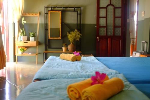Кровать или кровати в номере Yellow Farm Homestay at Tuy Hòa Phú Yên