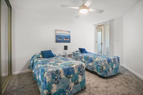 Postel nebo postele na pokoji v ubytování Ocean Views Unit 15