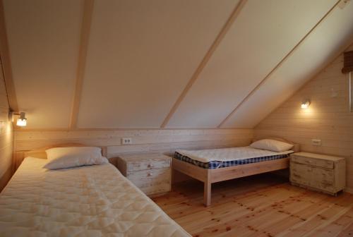 Postel nebo postele na pokoji v ubytování Mandjala Puhketalu - Cottages