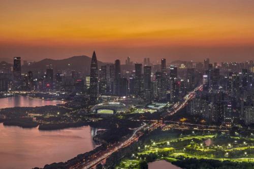 an aerial view of a city at night at Shangri-La Nanshan, Shenzhen, Stay for 2 consecutive nights and enjoy breakfast in Shenzhen