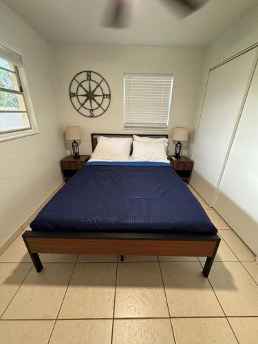 a bedroom with a bed with a blue mattress at Apartment in Bonita in Bonita Springs