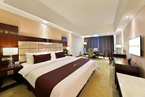 Katil atau katil-katil dalam bilik di Telecom Hotel Guilin