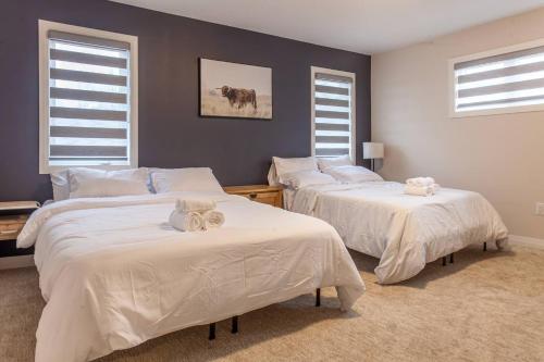 Ένα ή περισσότερα κρεβάτια σε δωμάτιο στο 4bed25 Bathbrand Newniagara Fallssleeps12