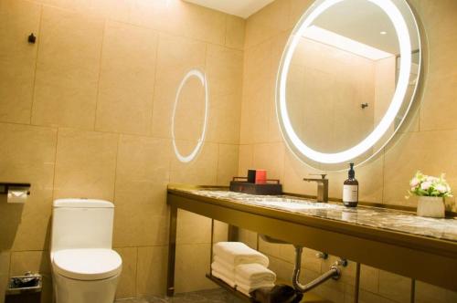 Ένα μπάνιο στο Echeng Hotel Enshi Minzu Road