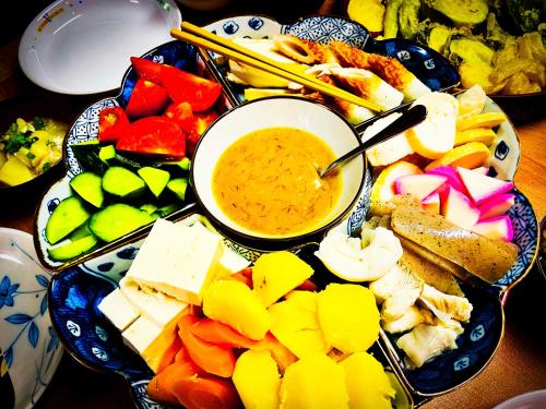 ゲストハウスの敷地内または近くでの食事または食べ物