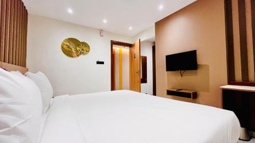 Postel nebo postele na pokoji v ubytování Hiive by Convivial Hotels