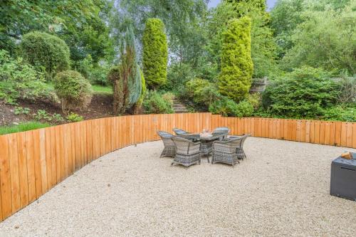 a patio with a table and chairs and a fence at 2 Bed in Brough oc-c31900 in Brough
