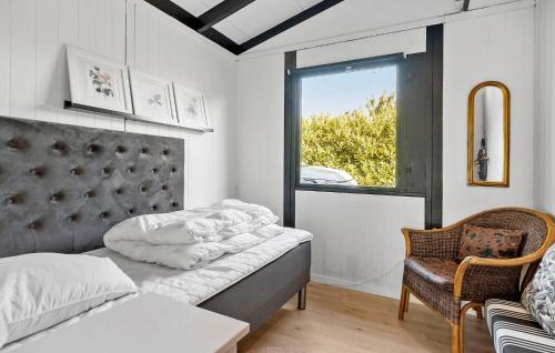 Ένα ή περισσότερα κρεβάτια σε δωμάτιο στο 3 Bedroom Awesome Home In Grevinge