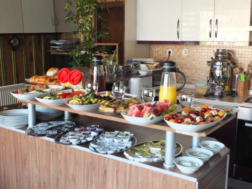 a buffet with many different types of fruits and vegetables at Anatolia cave hotel Pension in Goreme