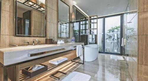 Koupelna v ubytování The Mulian Urban Resort Hotels Huadu