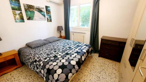 Postel nebo postele na pokoji v ubytování Bas de villa T3 avec piscine