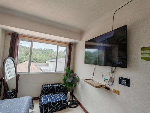 TV a/nebo společenská místnost v ubytování Mountain Breeze