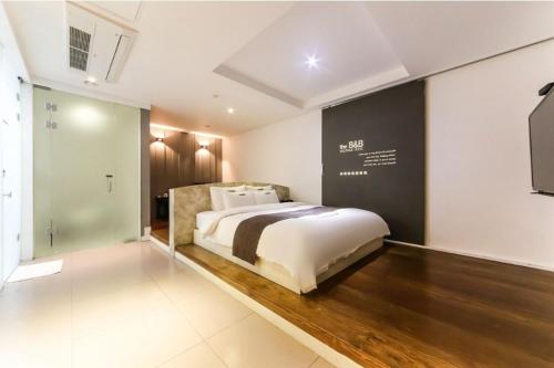 Ένα ή περισσότερα κρεβάτια σε δωμάτιο στο B&B hotel
