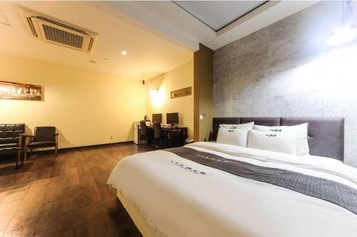 Ένα ή περισσότερα κρεβάτια σε δωμάτιο στο B&B hotel