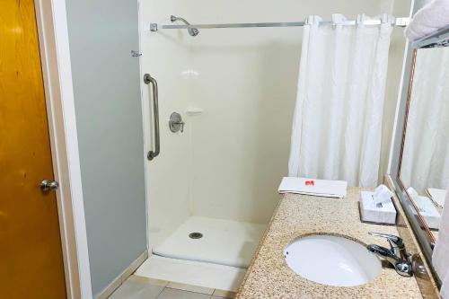a bathroom with a sink and a shower at Econo Lodge Inn & Suites Old Saybrook - Westbrook in Old Saybrook
