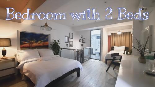 Ένα ή περισσότερα κρεβάτια σε δωμάτιο στο L1 Twin Bed Staycation in Bonifacio Global City 7