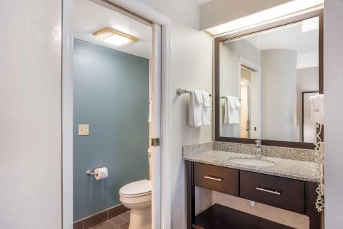 a bathroom with a sink and a toilet at Sleep Inn near Penn State - State College, PA in State College