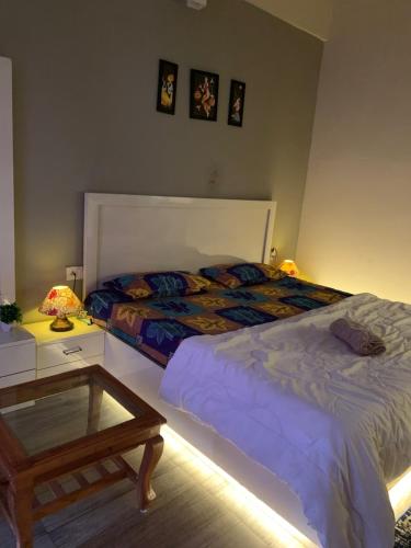 Postel nebo postele na pokoji v ubytování Sky villa