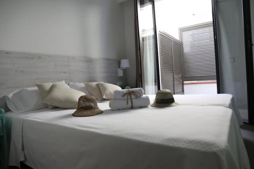Letto o letti in una camera di Hotel L'Escala Centre