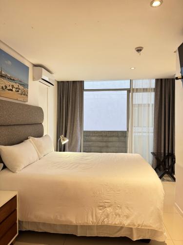 Ένα ή περισσότερα κρεβάτια σε δωμάτιο στο DeepSpace Apartments-2 at Freedom Plaza, Windhoek