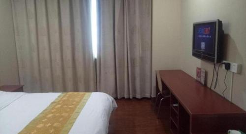 TV o dispositivi per l'intrattenimento presso GreenTree Inn Changshu South HaiYu Road Pedestrian Street Business Hotel