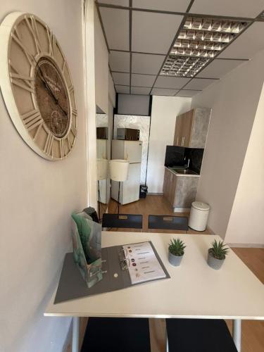 a large clock on a wall in a room at LivePro in Larnaka
