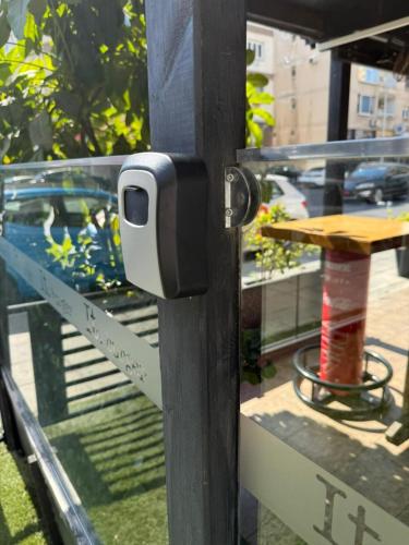a security camera on a table in front of a window at LivePro in Larnaka