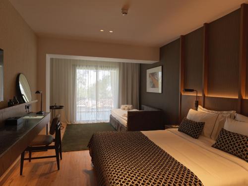 Postel nebo postele na pokoji v ubytování Pendeli Resort