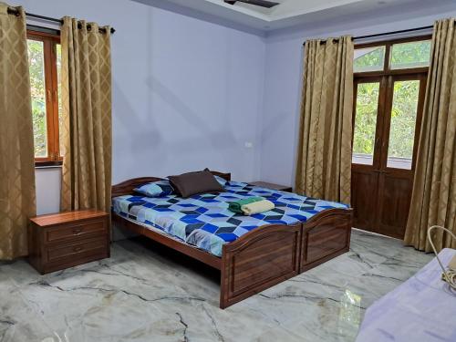 Postel nebo postele na pokoji v ubytování Monteiro Guesthouse