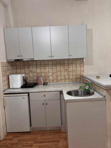 Η κουζίνα ή μικρή κουζίνα στο Matinas House