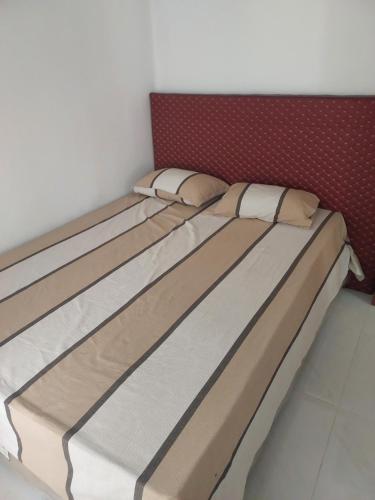 Кровать или кровати в номере The Deni's Place