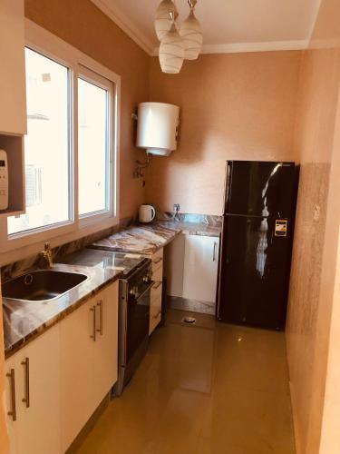 Una cocina o cocineta en Arabella Residence