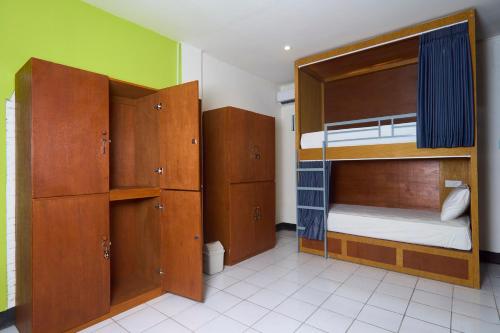 Postel nebo postele na pokoji v ubytování Attara Hostel Senggigi