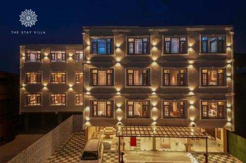 a building with lights on the side of it at The Stay Villa in Srinagar