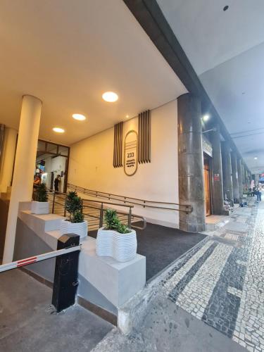 a building with a picture of a face on the wall at Radiante Amanhecer! in Belo Horizonte