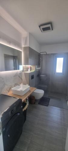 Ένα μπάνιο στο Sunside Residence