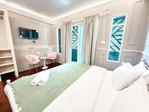 Ένα ή περισσότερα κρεβάτια σε δωμάτιο στο CASA Sukhumvit 11 - คาซ่า สุขุมวิท 11
