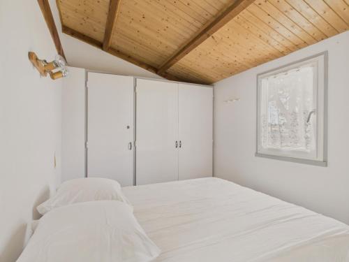 Ένα ή περισσότερα κρεβάτια σε δωμάτιο στο 500 m de la plage, appart 2 adultes 2 enfants