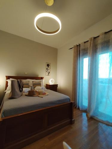 ISLAND Time Deluxe Apartment Downtown 3 floorsにあるベッド