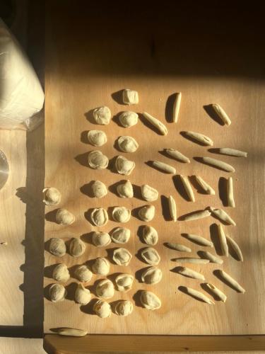 a bunch of oysters on a wooden cutting board at Masseria Caposella in Ugento