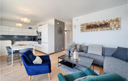 a living room with a couch and a table at Nice Home In Kastel Gomilica With Sauna in Kaštela