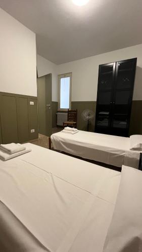 Nettuno Comodità e Relax,にあるベッド