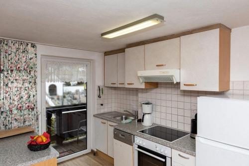 Kuchyň nebo kuchyňský kout v ubytování Haus Rosemarie