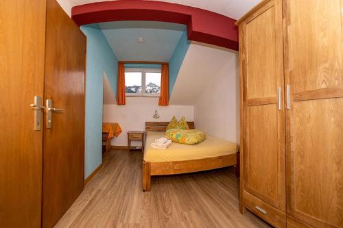 Postel nebo postele na pokoji v ubytování Haus Rosemarie