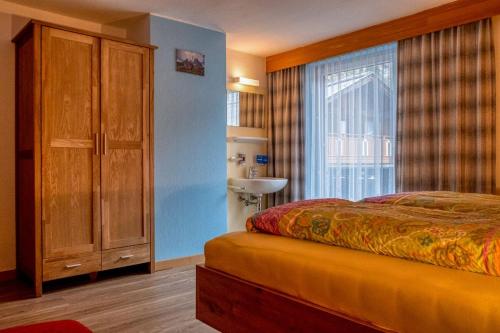Postel nebo postele na pokoji v ubytování Haus Rosemarie