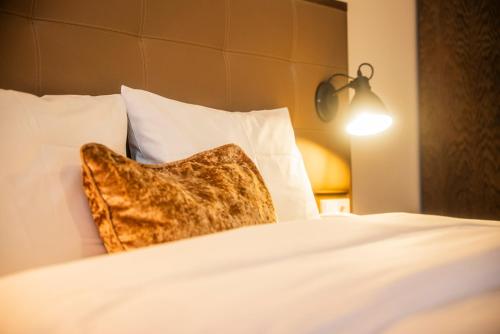 Parkhotel Kurhausにあるベッド