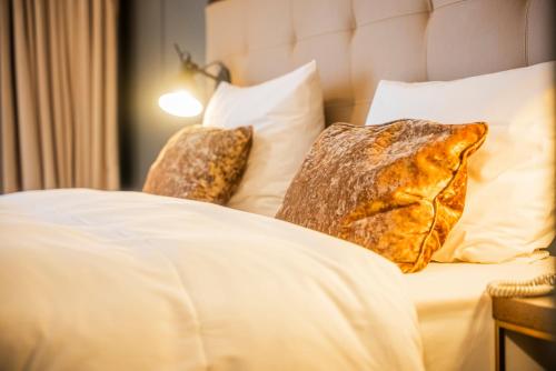 Parkhotel Kurhausにあるベッド